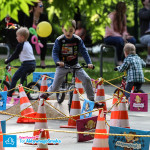 Dzieci na hulajnogach, rowerkach biegowych podczas Dnia Dziecka 2015 Warszawa